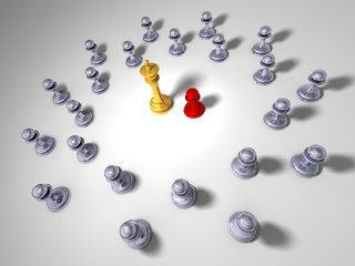 Red pawn in front of a big golden king with grey pawns