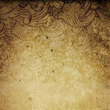 Aged vintage background with floral ornament elements.