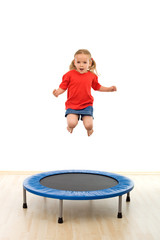 Little girl jumping on trampoline - obrazy, fototapety, plakaty