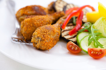 Breaded chicken with vegetables