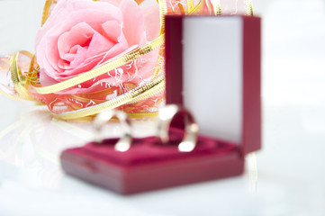 Rose and wedding rings
