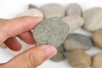 Fototapeta na wymiar trzymając kamień