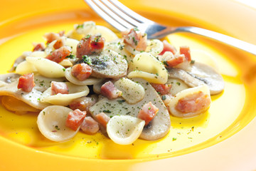 pasta orecchiette with bacon and champignons