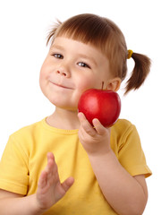 Cute child is going to bite an apple