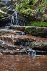 little waterfall cascade in the garden