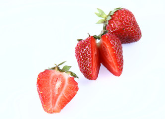 Strawberries  (a whole one, a half and one cut in half)