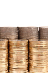 Coins organized in columns and rows isolated on white background