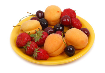 Fruits on the yellow plate