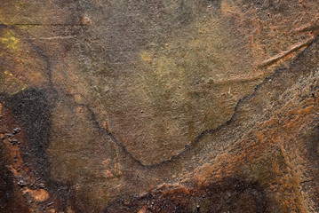 brown rusty looking painting upclose