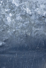 blue scratches on a metal surface