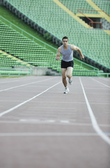 Fototapeta na wymiar young athlete running