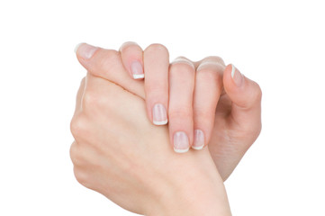 Woman hands with french manicure isolated on white