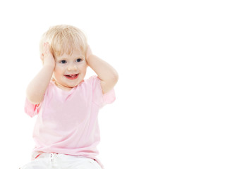 smiling cute baby girl clutched her head