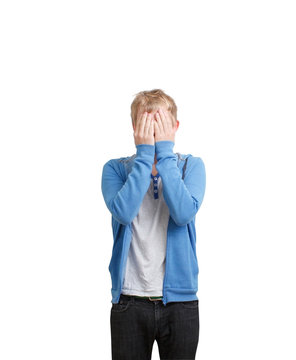 Student hiding face