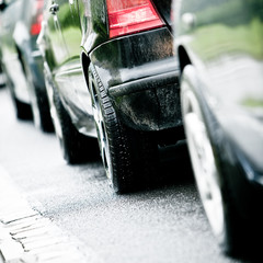 Traffic jam in flooded highway cause rain