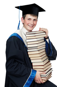 graduate in gown with books