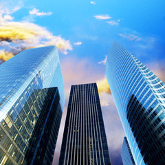 Fototapeta na wymiar Modern office Skyscrapers on the sunny beautiful sky