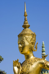 Fototapeta na wymiar Kinnari statue in Grand Palace, Bangkok Thailand.