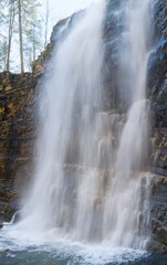 Fototapeta na wymiar Waterfall on mountain forest