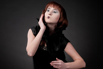 Fototapeta premium Close-up portrait of beautiful girl with chess makeup