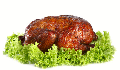 homemade smoked whole chicken on leaf lettuce bed