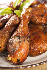 homemade smoked  chicken drumstick on a plate