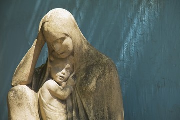 Stone Statue Of The Virgin Mary Holding Jesus