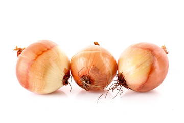 Three onions isolated on white