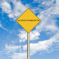Road sign to achievement