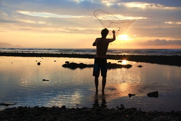p&ecirc;cheur au filet