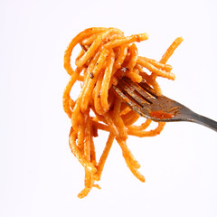 Spaghetti with sauce bolognese hanging on a fork