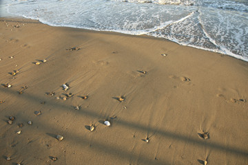a background image of beach with pebble stone