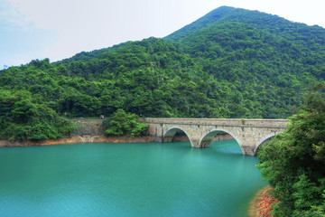 lake with stone bridge