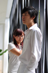 Young Asian Couple in  despair over certain issues 3
