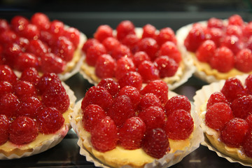 Raspberry tarts sold at a dessert market