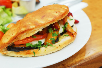 baked sandwich with eggs and vegetables