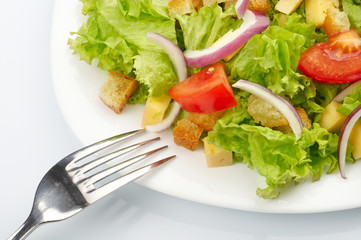 Salad on white plate