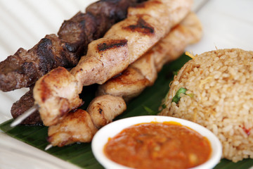 fried rice and brochettes