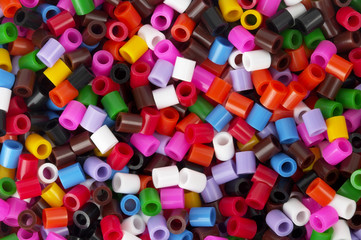 Colored plastic pieces background