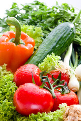 Fresh organic vegetables isolated on white