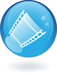 Glossy blue film reel in red glass button isolated on white