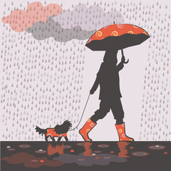 Girl walking with small dog under rain.