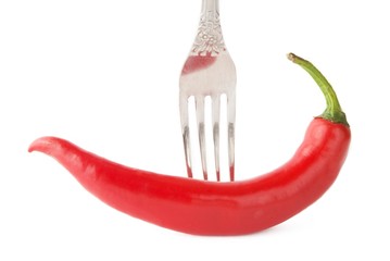 Obraz na płótnie Canvas Chili pepper on fork
