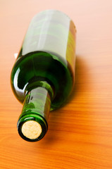 Bottle of wine on the wooden table