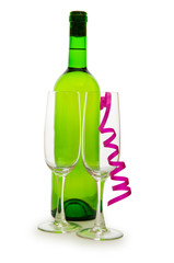 Bottle of wine and glass with streamer on white