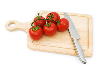 Red tomatoes isolated on the white background