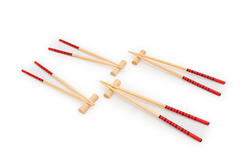 Wooden chopsticks isolated on the white background