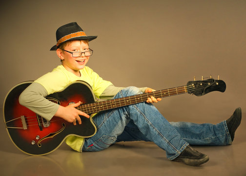 The boy with a guitar