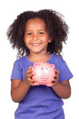 Fototapeta na wymiar Adorable african little girl with piggy-bank