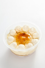 cup of whiskey cake with cream